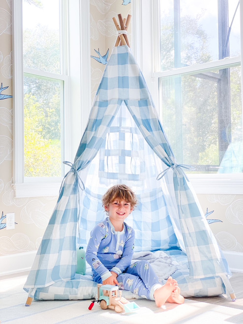 This tent is made of a light blue buffalo check (also known as gingham) and it is made of 100% cotton twill fabric.