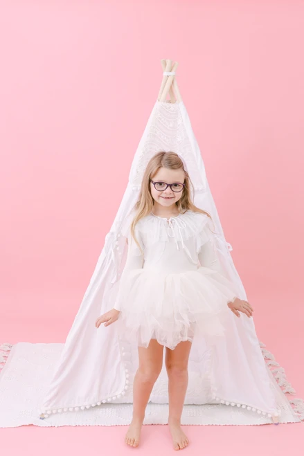 This tent is all white and it is made of 100% pima cotton fabric. The top triangle of the tent has a stunning embroidered white lace.