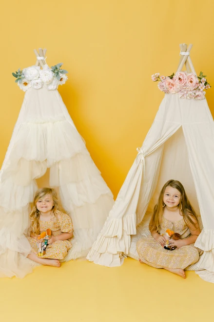 This play tent has a cream base made from 100% premium pima cotton (OEKO-TEX certified) with ivory/cream tulle colored layered doors.