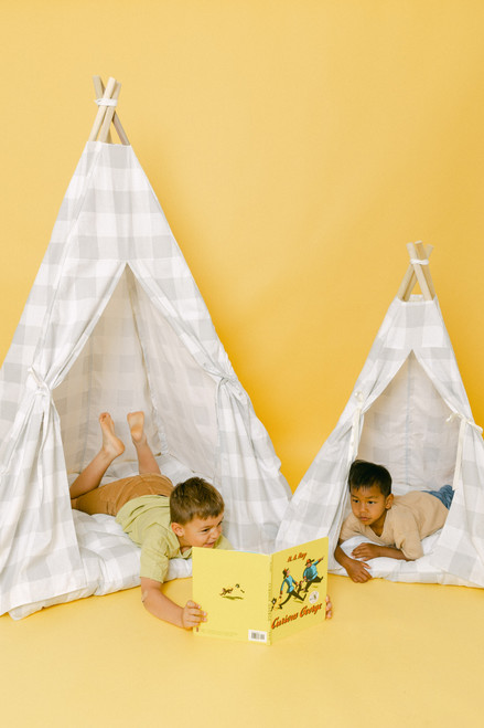 The Rowan Play Tent is a grey gingham/buffalo plaid play tent. This play tent is made from 7 oz. cotton (OEKO-TEX certified) fabric. The play tent comes with tie back doors. It has four wooden poplar rods that hold up a beautifully crafted play tent.