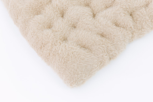 A ultra soft cuddle llama fur in color sand (beige).