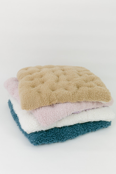A ultra soft cuddle llama fur in color sand (beige).