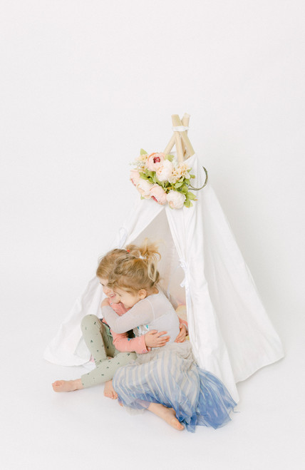 This all white playtent is made from 100% twill cotton fabric. Perfect density. The playtent comes with tie back doors.