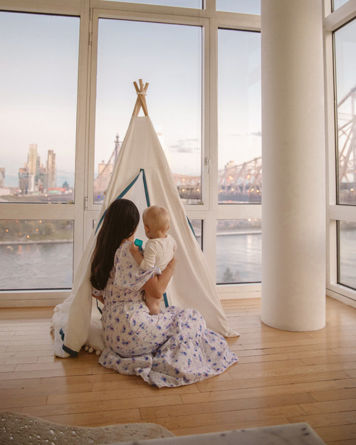 The Tyler Play Tent is very neutral but ready for adventure. This all white play tent is made from 100% premium cotton (OEKO-TEX certified) and denim blue colored binding. The play tent comes with tie back doors. It has four wooden poplar rods that hold up a beautifully crafted play tent.
