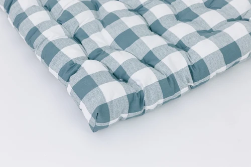 A gingham/buffalo check in color gunmetal using 100% twill cotton and stuffed with 100% premium hypoallergenic fiberfil.