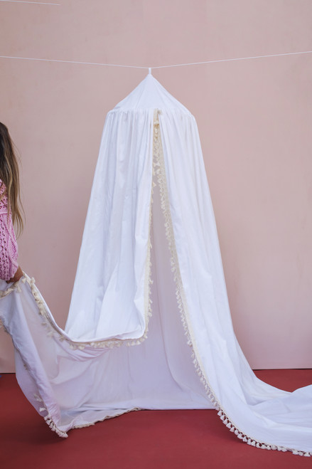 The White & Cream Tassel Canopy has beautiful vertical tassel trim on its doors and uses about 15 yards of unprinted white twill cotton.