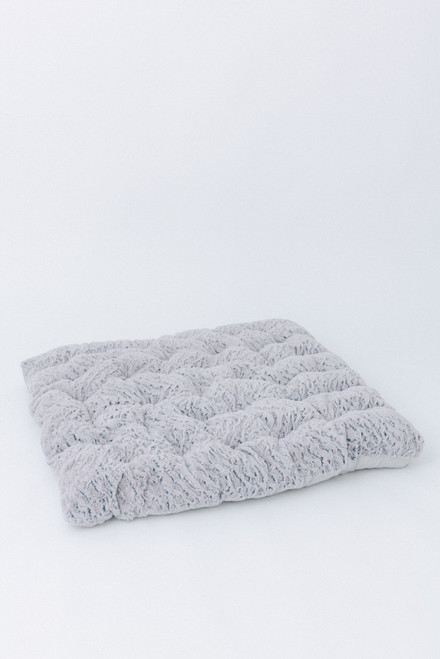 A ultra soft fur fabric with zebra stripe design in color gray.