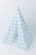 This tent is made of a light blue buffalo check (also known as gingham) and it is made of 100% cotton twill fabric.