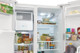 Frigidaire® Scratch & Dent 25.6 Cu. Ft. White Side-by-Side Refrigerator FRSS2623AW