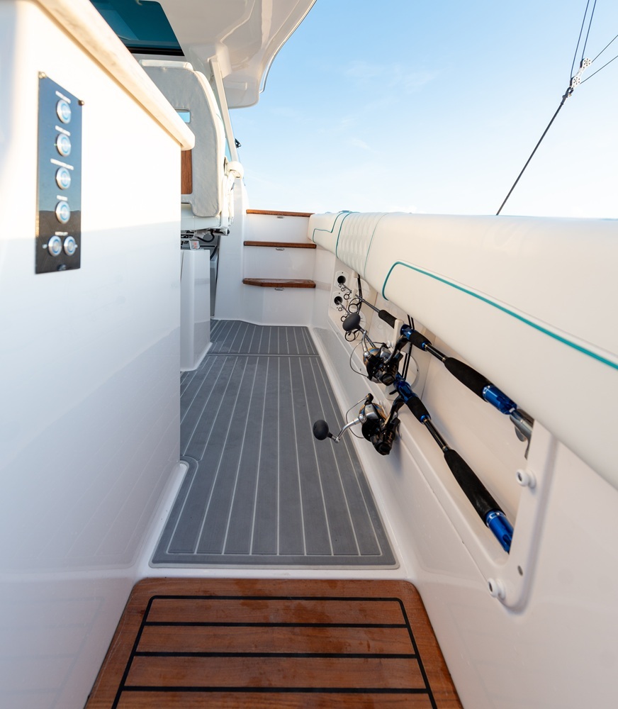 Regal side walkway fitted with gray SeaDek non-skid decking