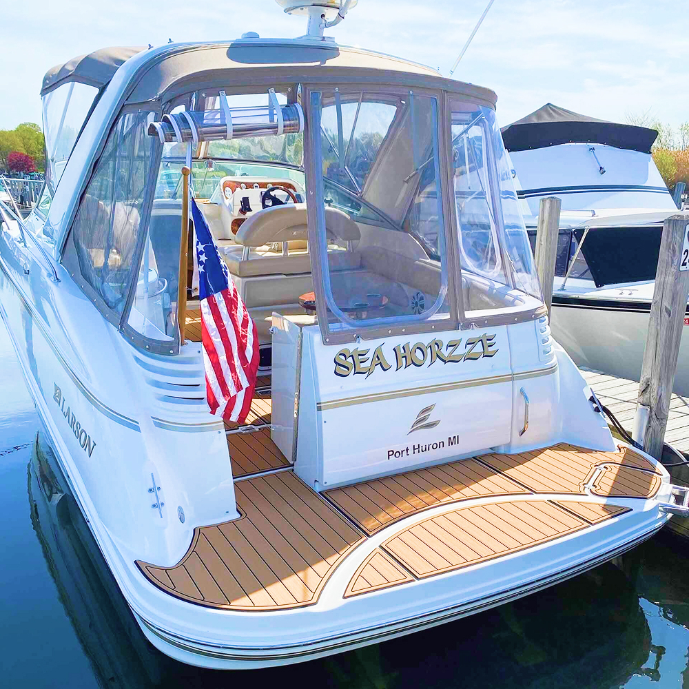 Rear side of a boat with swim platform and Seadek pre cut kits installed