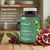 LDL Biotect bottle on a kitchen counter with pomegranate and chokeberries, with the text: Heart-healthy ingredients. Organic pomegranate, organic chokeberry, and organic amla fruit support a healthy cardiovascular system.