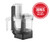 Vitamix food processor attachment with a clear work bowl, feed chute, and black base, with a badge reading: Includes exclusive bonus recipe booklet.