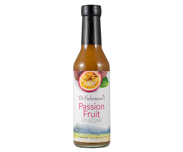 Dr. Fuhrman Passion Fruit Vinegar in an 8 fl oz (237 mL) glass bottle with a label showing a halved passion fruit.
