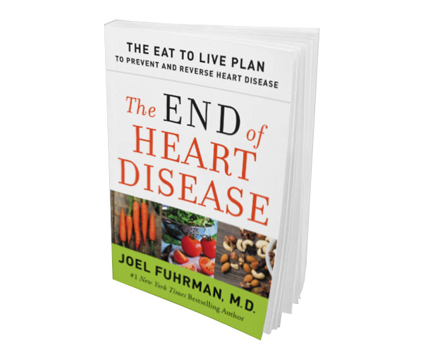 The End of Heart Disease by Joel Fuhrman, M.D.: paperback with the subtitle The Eat to Live plan to prevent and reverse heart disease, above photos of vegetables, fruit, and nuts.