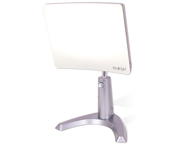 Carex Day-Light therapeutic light: a large rectangular light panel on an adjustable silver stand.
