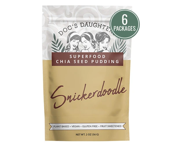 Doc's Daughters Snickerdoodle Superfood Chia Seed Pudding pouch, tan, with a badge reading 6 packages; plant based, vegan, gluten free, fruit sweetened.