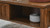 Carmine 39.38" Rectangular Coffee Table with Fluted Sliding Door, Walnut Finish