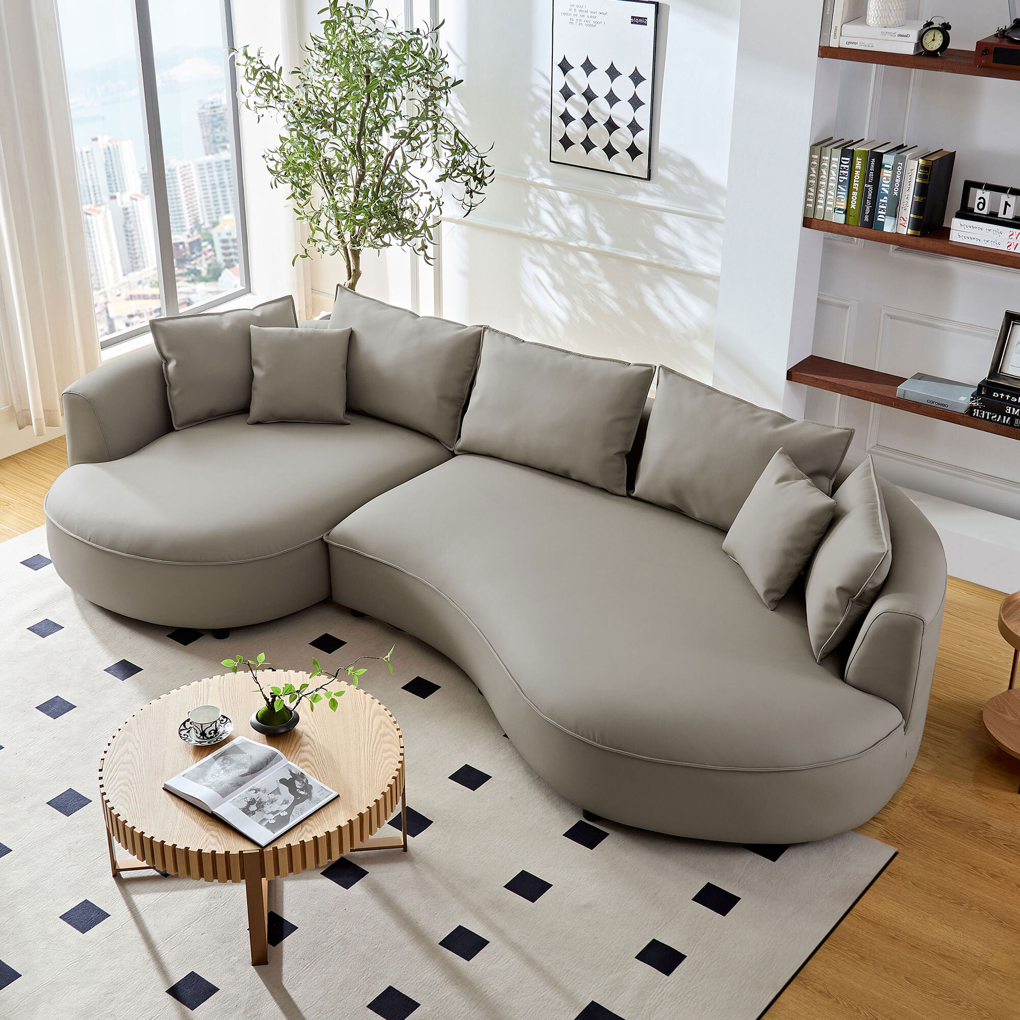 Barronne Wide Curved Sectional Sofa in Bonded Leather with Accent Pillows