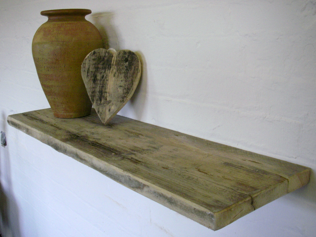 Distressed reclaimed driftwood mantel shelf