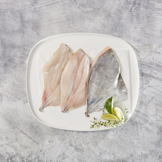 Mirror Dory Fillets on plate. Affordable fish to feed your family