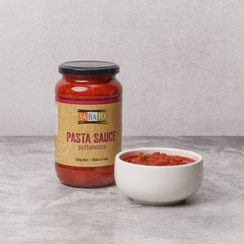 Sabato Puttanesca Pasta Sauce in glass jar on grey background