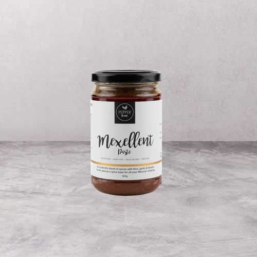 Pepper & Me Mexican Inspired Mexellent paste on grey background. Cook with any seafood.
