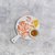 Cooked Prawn Cutlets on board with lemon and infused oil