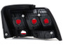 Raxiom 49080 Raxiom 49080 99-04 Ford Mustang Excluding 99-01 Cobra Tail Lights- Black Housing (Smoked Lens)