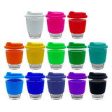 A collection of Carlo Glass Coffee Cups in various colours with silicone lids and transparent glass bodies.