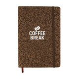 A brown A5 notebook with a textured cover and an elastic band, featuring a logo on the front.