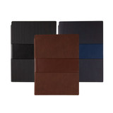 A set of three Dresden Notebooks in black, blue, and brown, featuring ribbed textures and a logo.