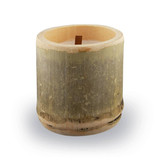 A bamboo candle in a cylindrical holder, featuring a wooden wick and a light-coloured wax interior.