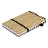 A bamboo notebook with a spiral binding and an elastic band closure, featuring a black strap.