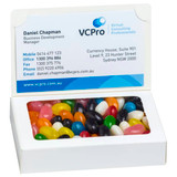 A Bizcard Box containing a mix of colourful jelly beans, featuring a branded sticker on the front.