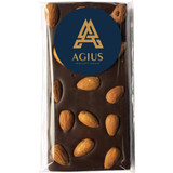 A dark chocolate bar with almonds, packaged with a branding sticker on the front.