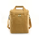 A tan kraft paper lunch cooler bag with dual handles and a detachable shoulder strap. It features a front pocket and a zip closure.