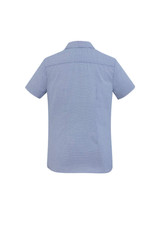 A short sleeve women's button-up shirt in a light blue fabric, featuring a subtle pattern and a back yoke.