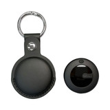 A black tracking tag with a PU case and a metal keyring attached, featuring a logo.
