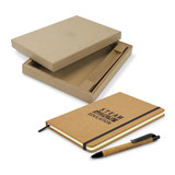 A brown cork notebook with an elastic band and a matching pen, presented in a cardboard box.