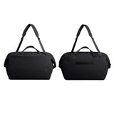 A black duffel bag with dual handles and an adjustable shoulder strap, featuring a logo on the side.