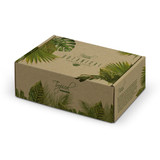 A die cut box with a locking lid, featuring a tropical botanical design, in natural brown and green colours.