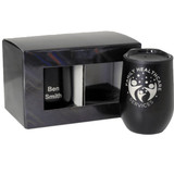A black drink bottle and a cup in a black gift box, featuring a logo and a personalisation option. A black drink bottle and a cup in a black gift box, featuring a logo and a personalisation option.