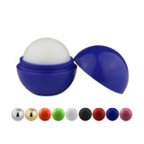 A blue lip balm ball with a white sphere top, surrounded by various coloured balm containers including gold, silver, green, and red.