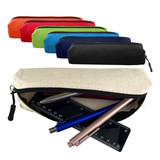 A variety of canvas tube pencil cases in red, orange, green, blue, black, and cream, with pens and a ruler inside.