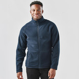 A navy fleece jacket with a zip front and stand collar, featuring a logo and two side pockets.