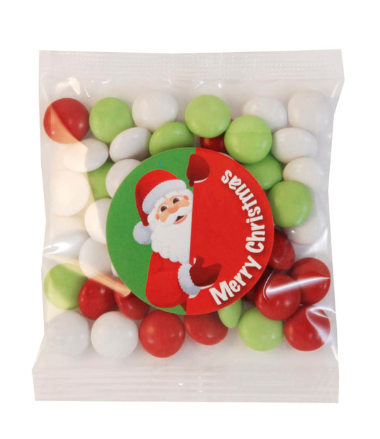 Christmas Choc Beans in a clear bag, featuring red, green, and white chocolate beans, with a festive label. Christmas Choc Beans in a clear bag, featuring red, green, and white chocolate beans, with a festive label.