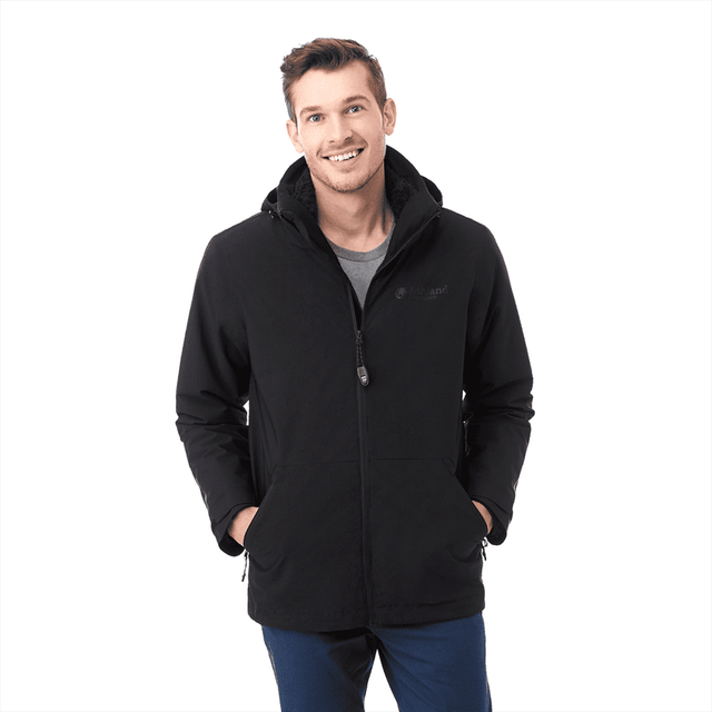 A black soft shell jacket with a hood, featuring a zip front and side pockets, worn by a smiling man.