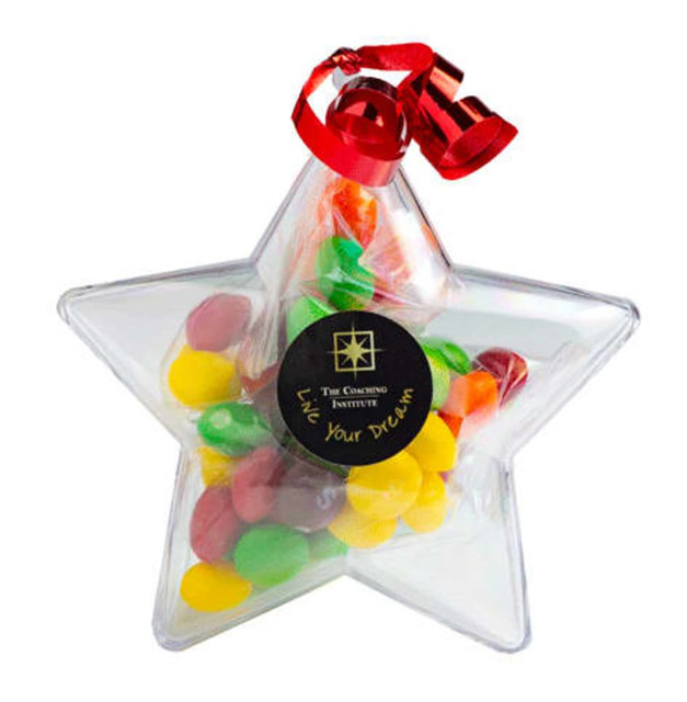Acrylic star container filled with colourful Skittles in assorted flavours, topped with a red ribbon and a branded sticker.