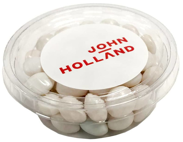 A clear tub filled with white and pastel mints, featuring a branded lid.